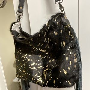 Leather and cow hid western style purse